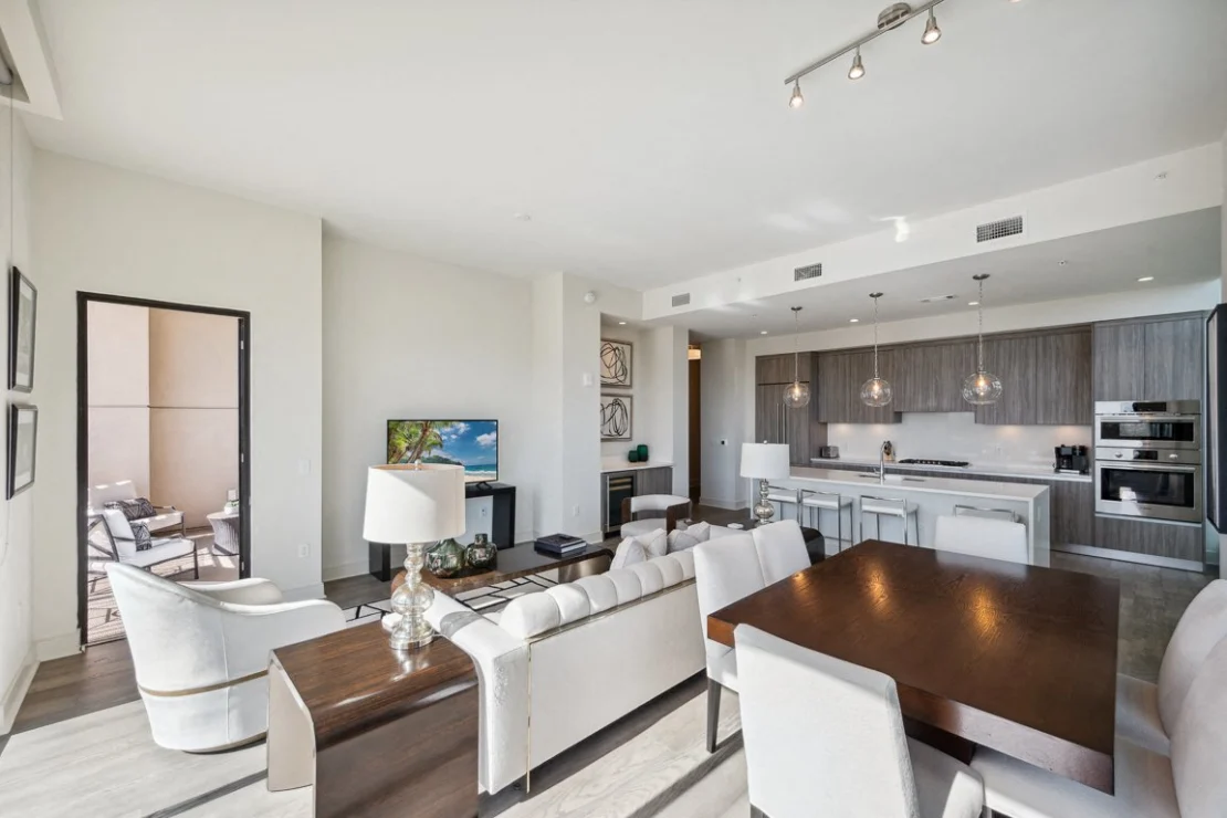 Modern open-plan living room and kitchen area.