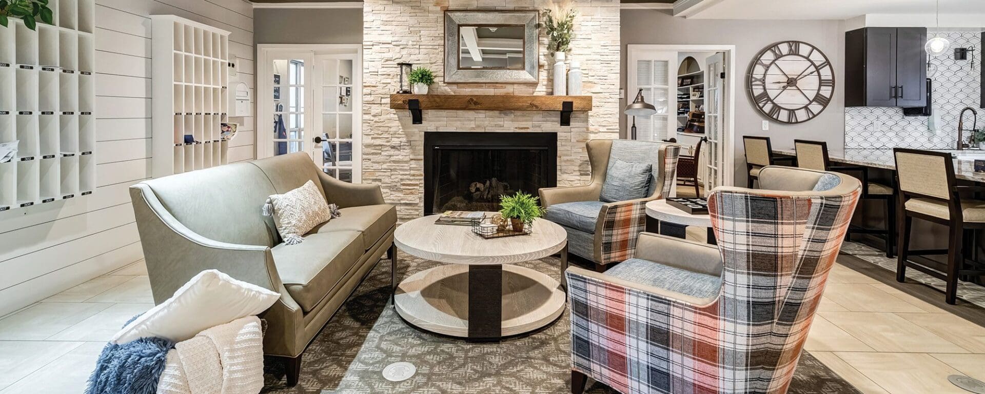Cozy living room with fireplace and seating.