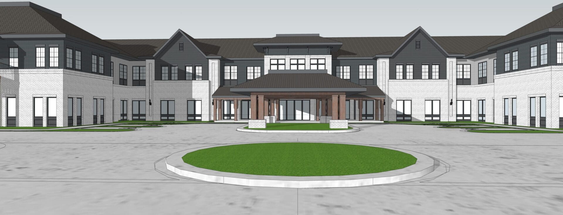 Two-story building with circular driveway.
