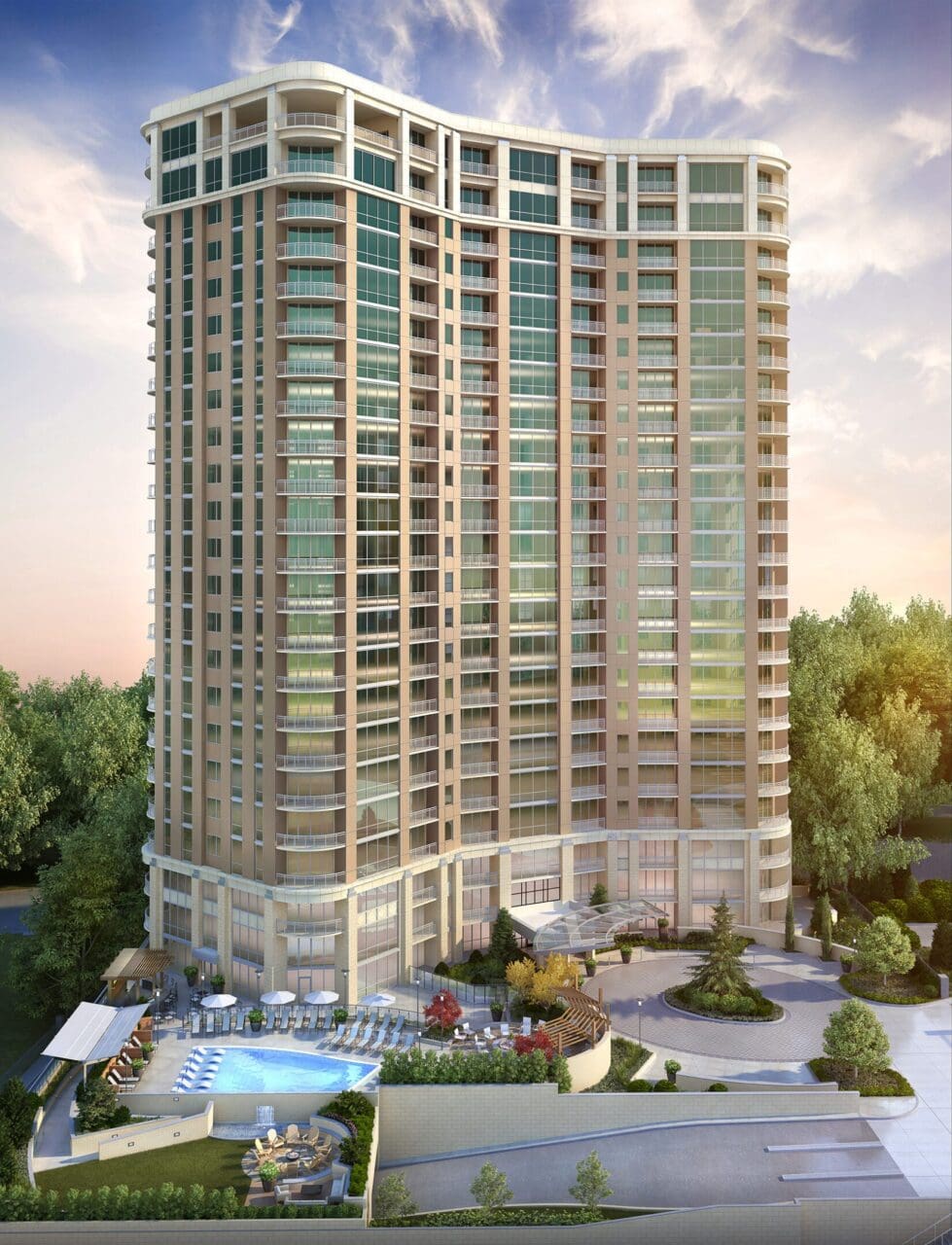 Tall modern apartment building with pool.