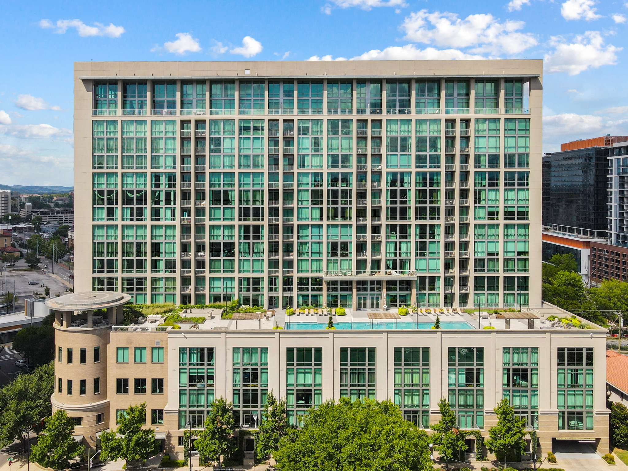 Modern high-rise building with glass windows.