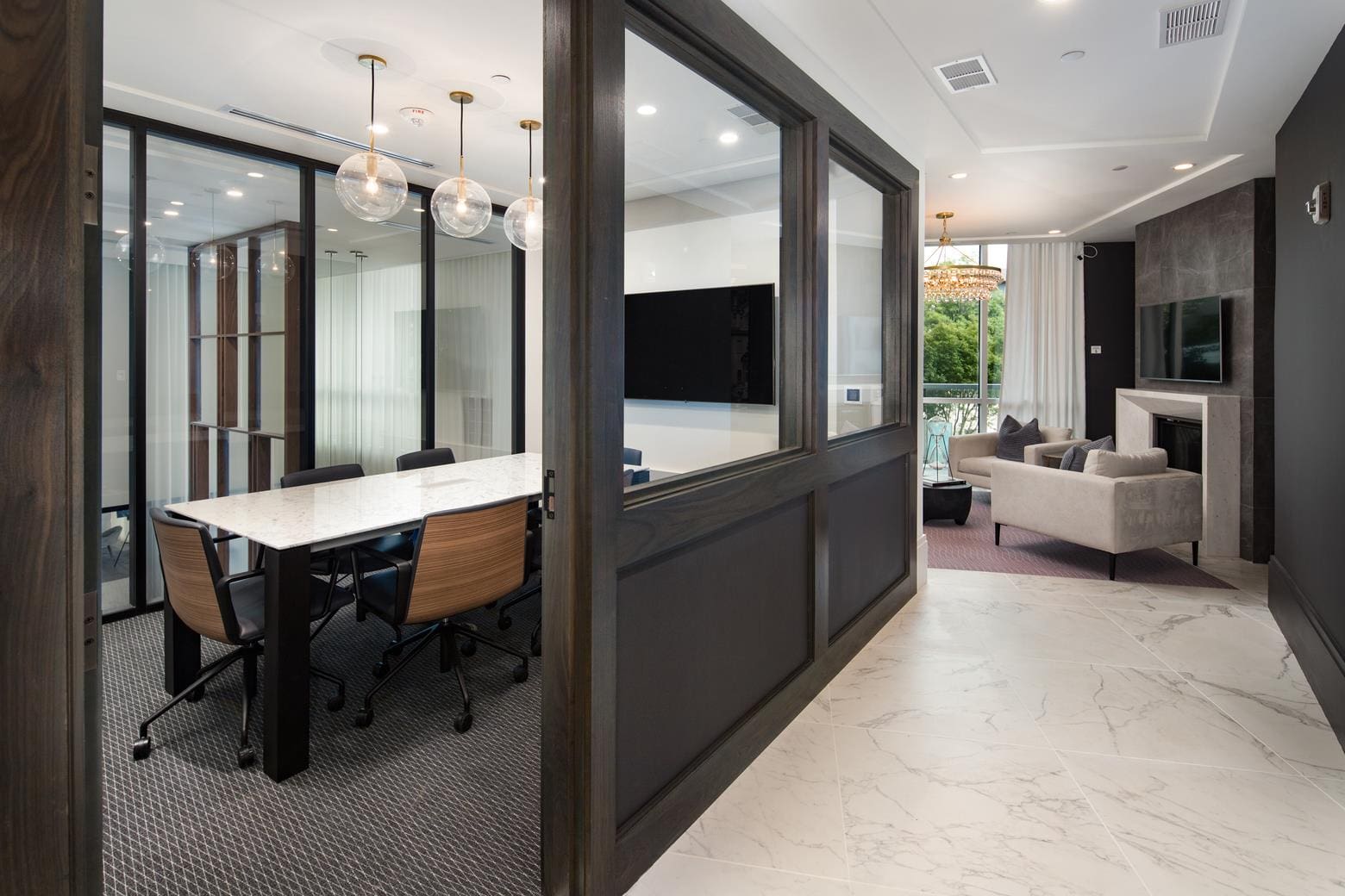 Modern office and lounge area with furniture.