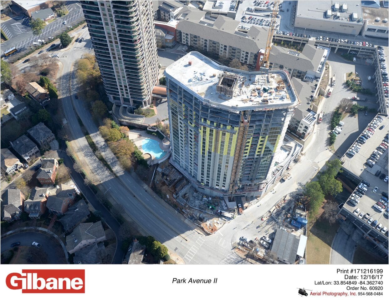 Aerial view of construction site with buildings.