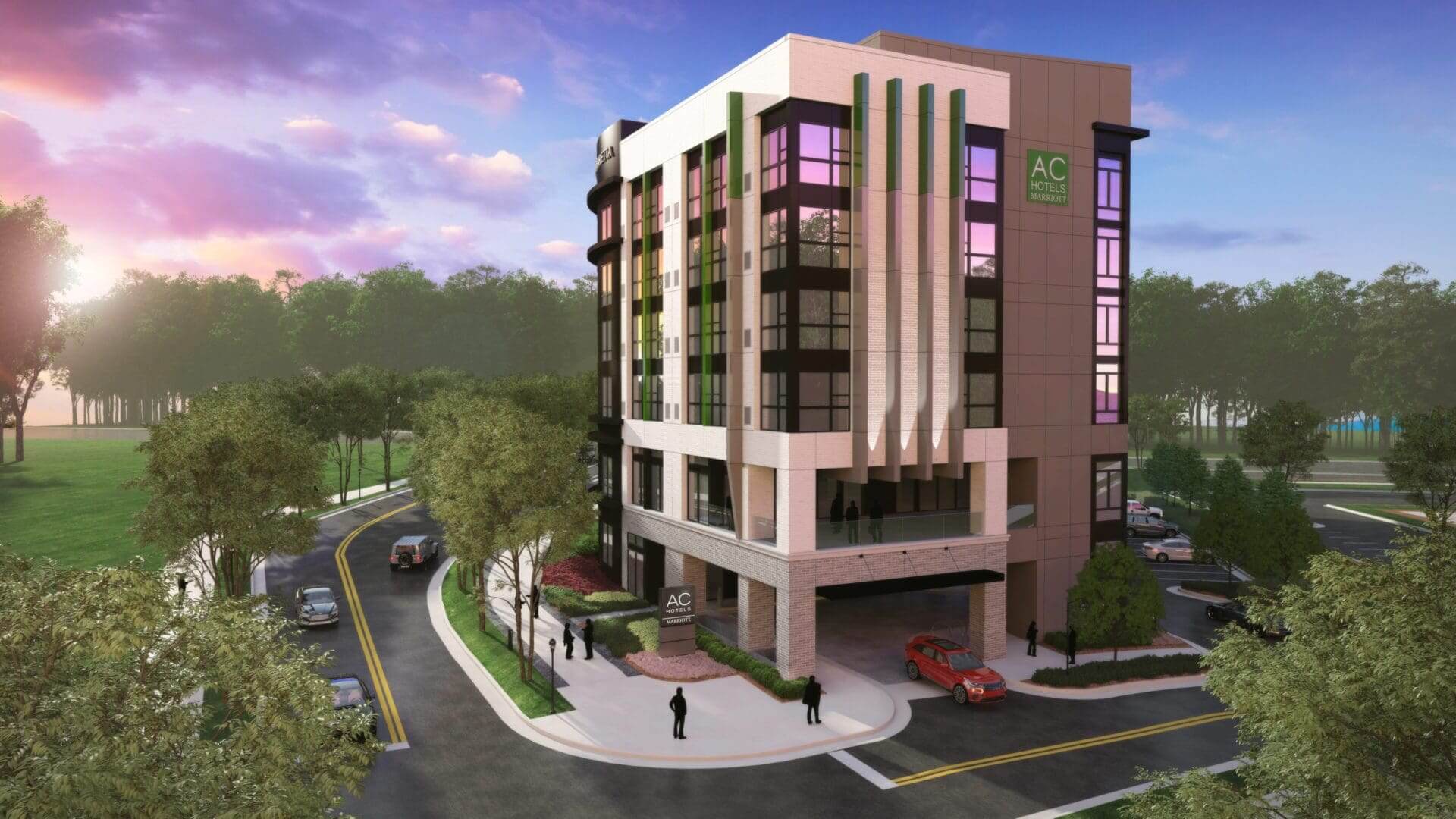 Modern hotel building at sunset, street view.
