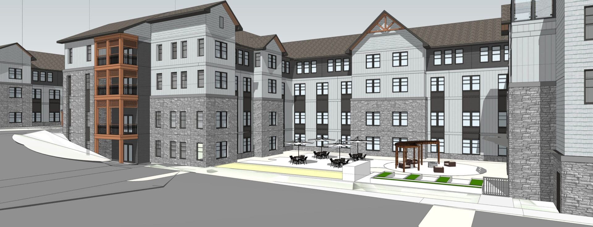 Modern multi-story residential building with courtyard.