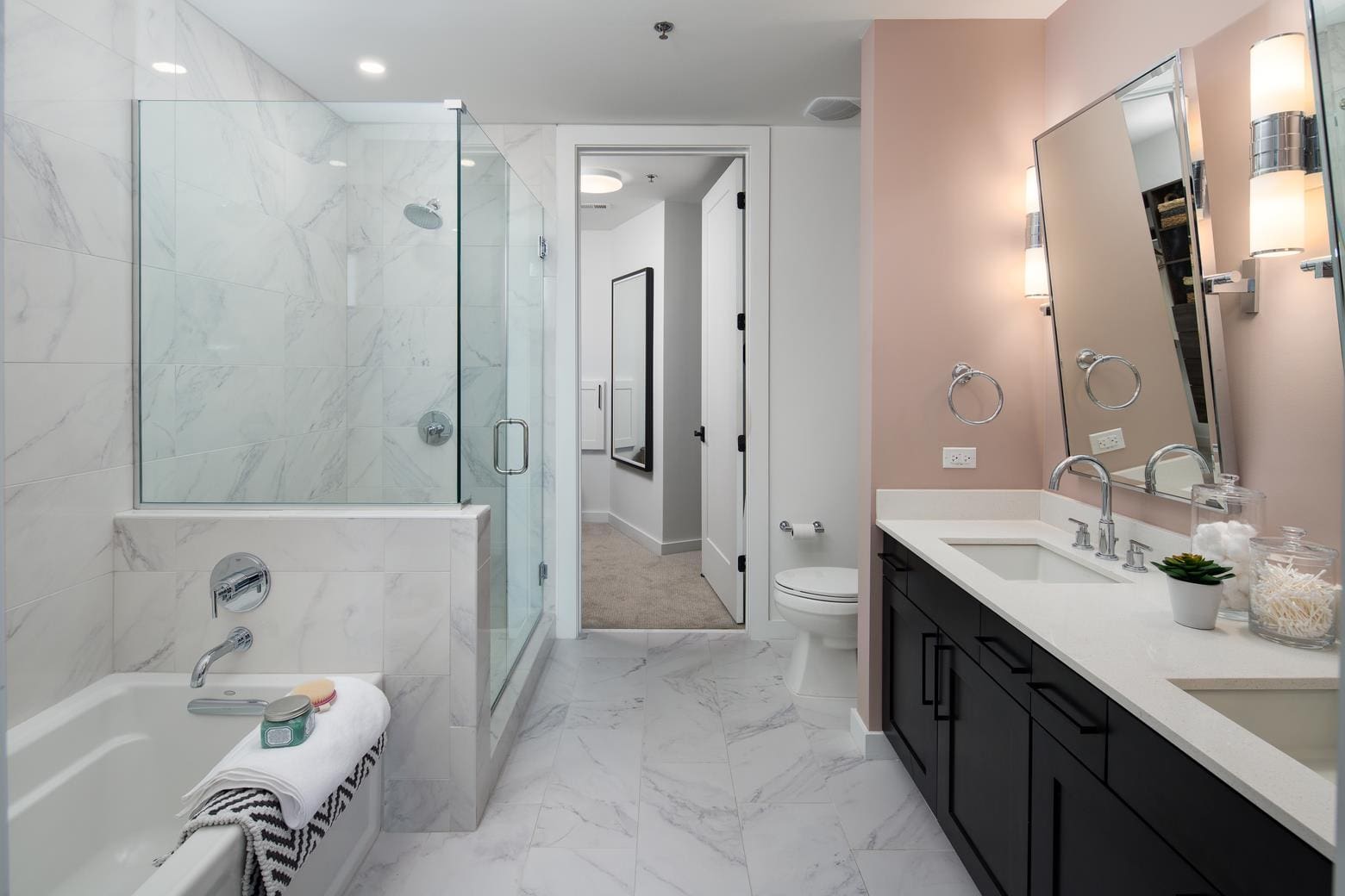 Modern bathroom with shower and double vanity.