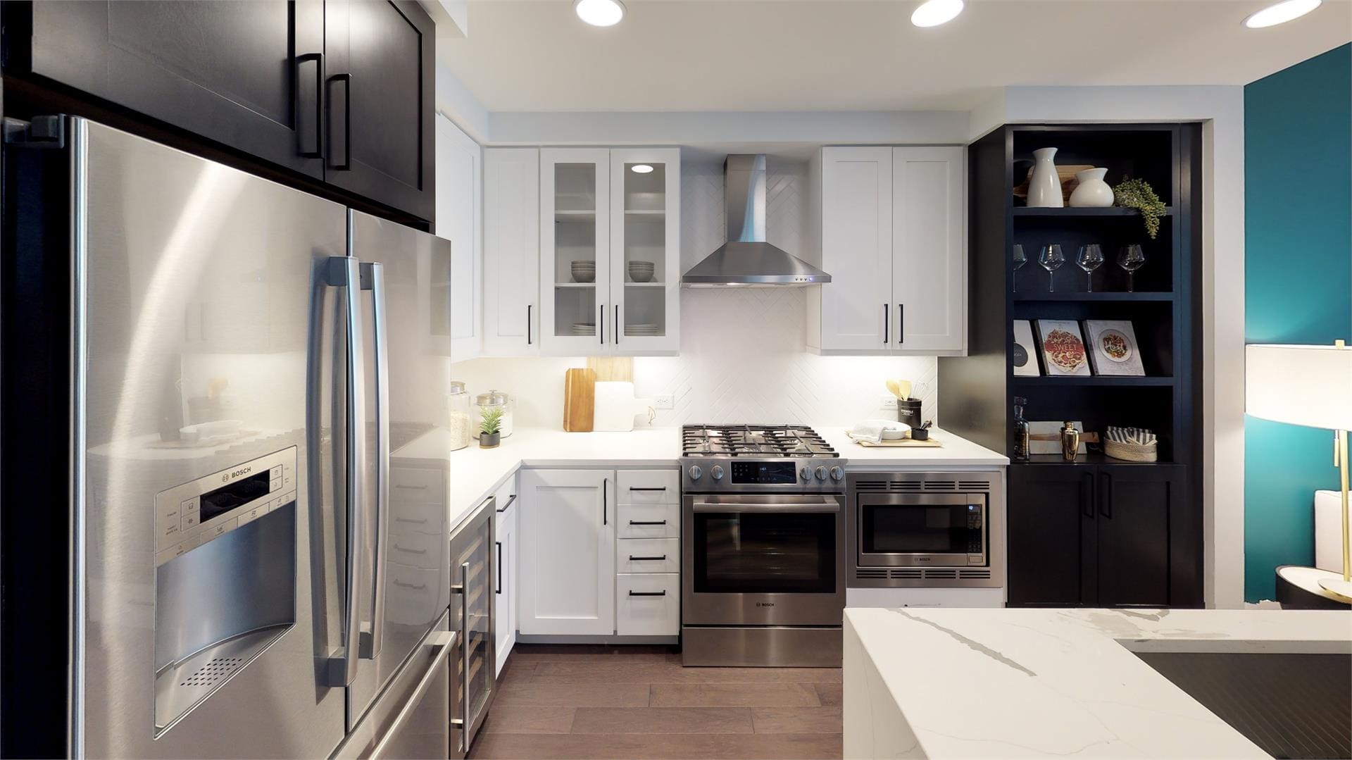 Modern kitchen with island and stainless appliances