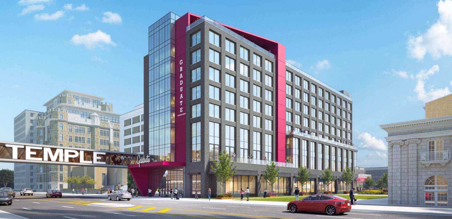 Modern hotel building with red accents, street.