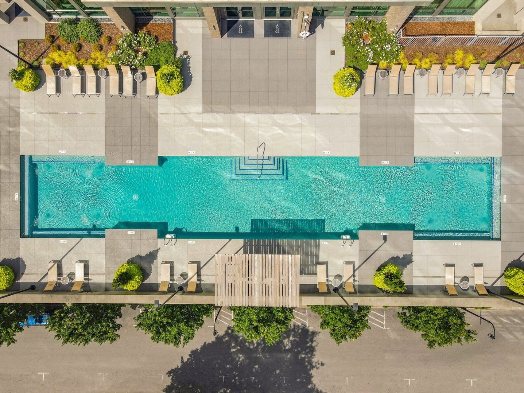 Aerial view of modern outdoor swimming pool.