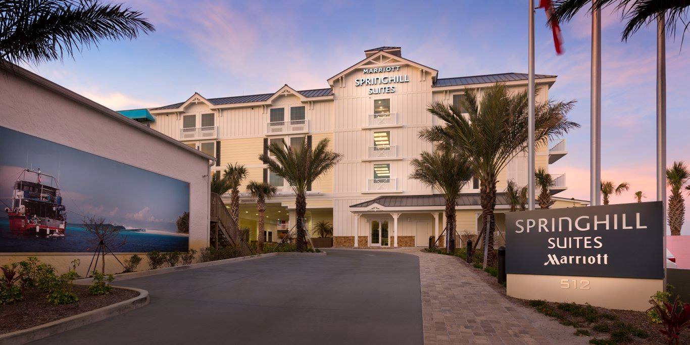 SpringHill Suites hotel exterior at sunset.