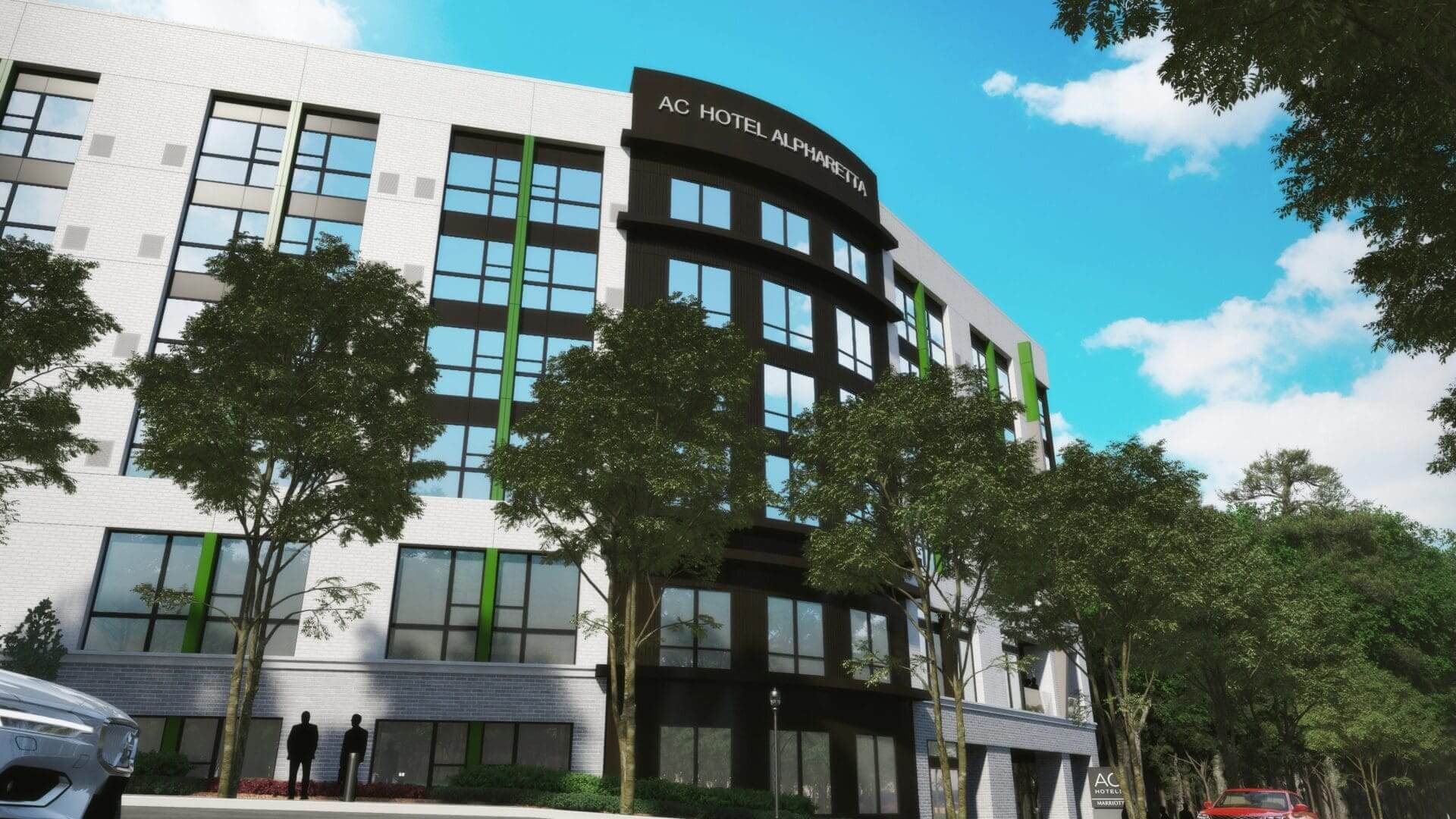 Modern hotel building with trees and sky.