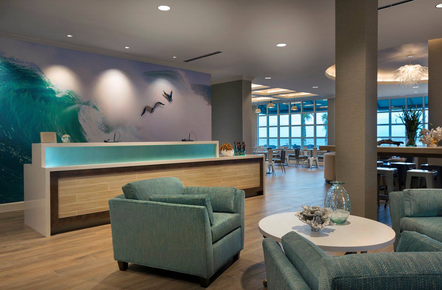 Modern lounge area with ocean-themed decor.