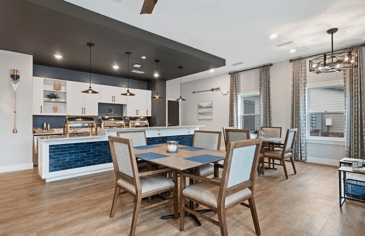Modern dining area with blue accents.