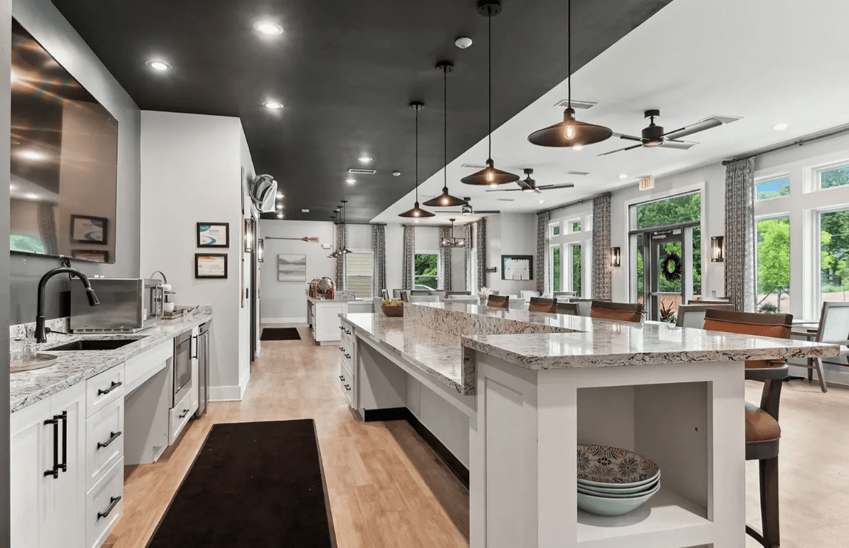 Bright open kitchen with long granite island