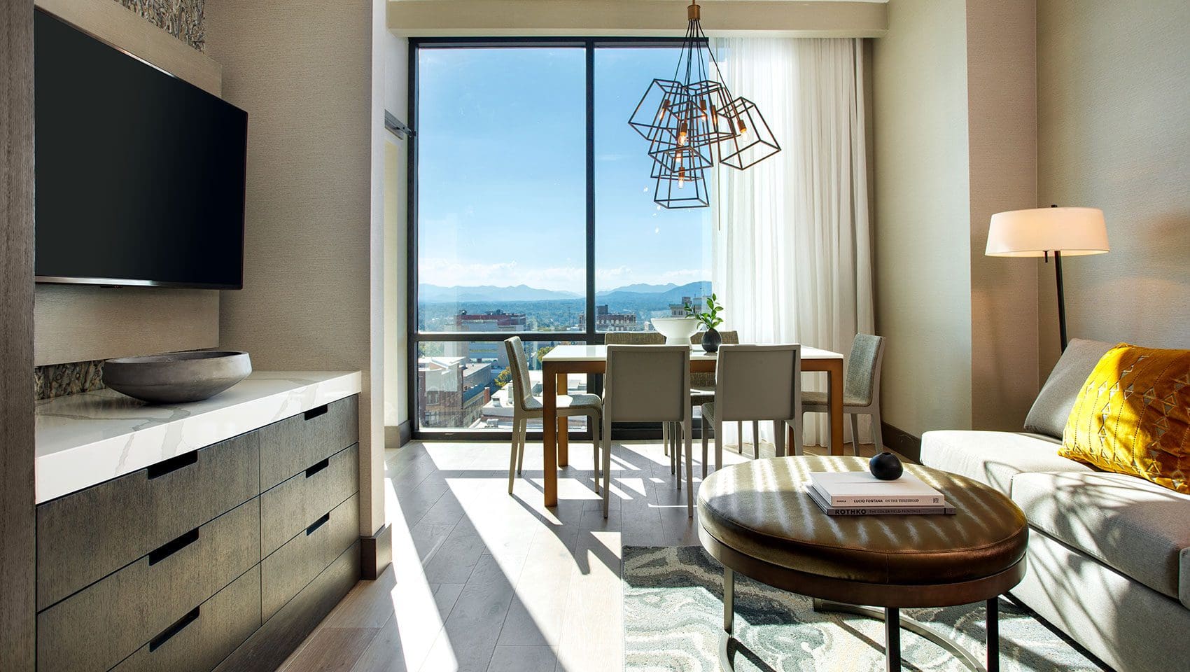 Modern living room with mountain views.