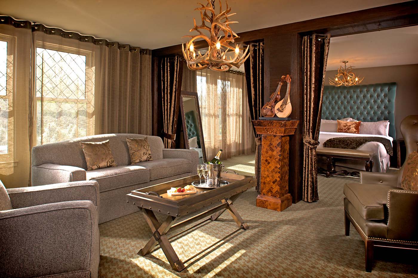 Luxurious hotel suite with elegant decor.