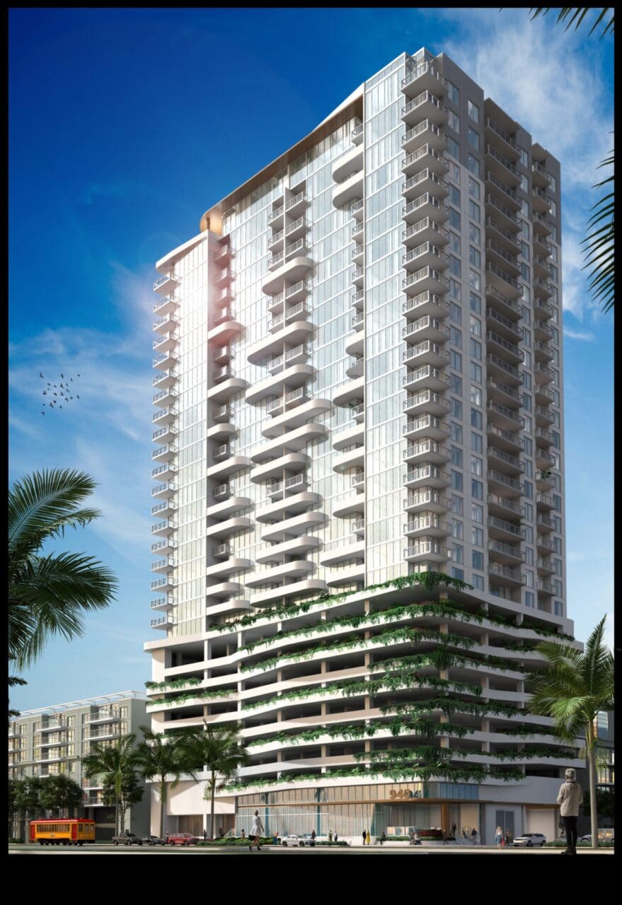 Modern high-rise building with palm trees.