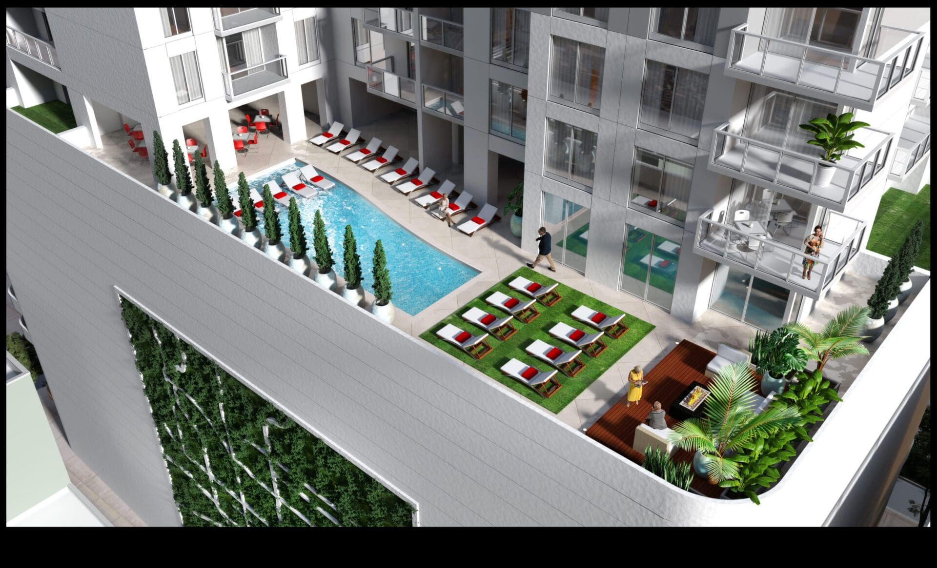 Rooftop pool area with lounge chairs.