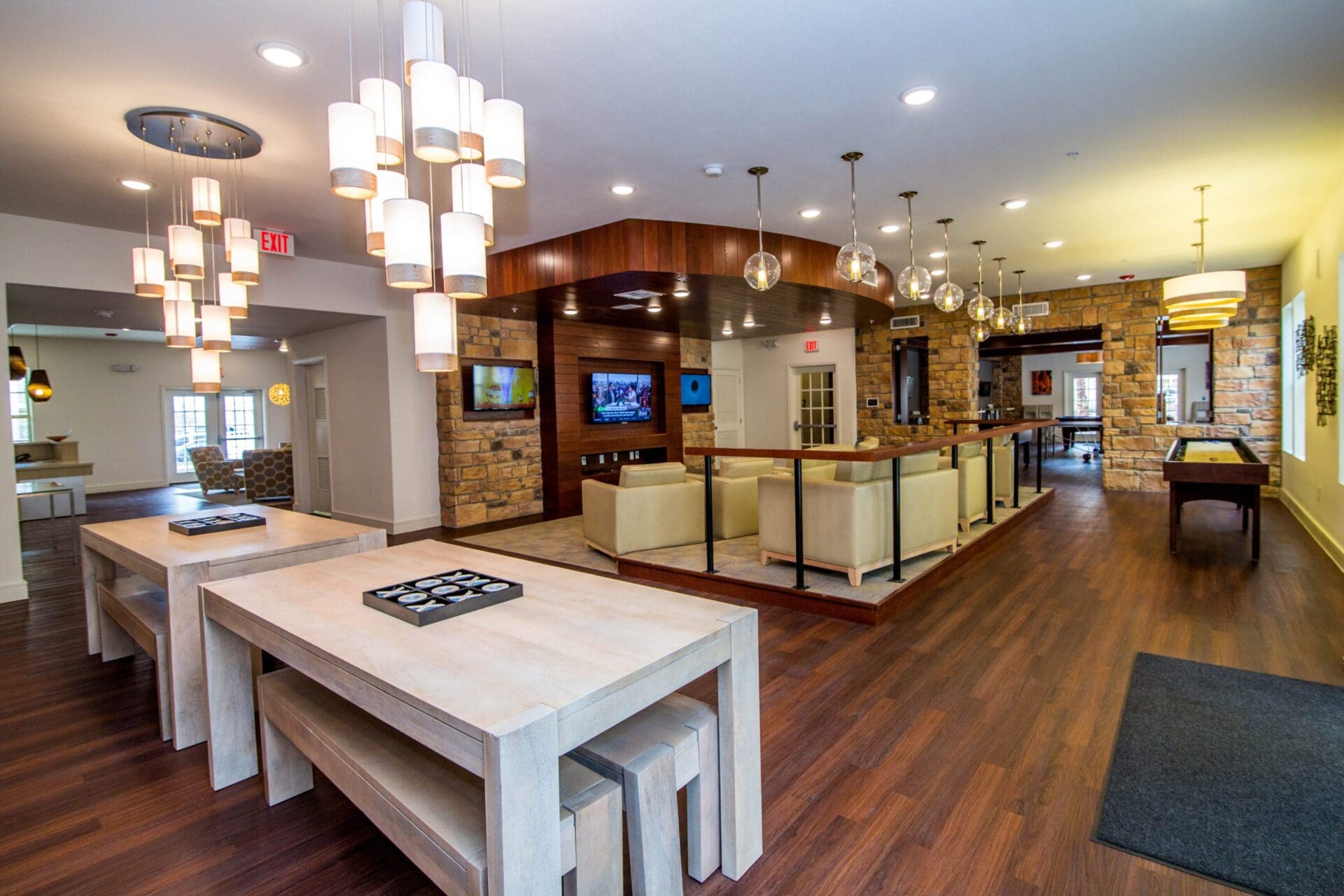 Modern lounge area with stylish lighting fixtures.