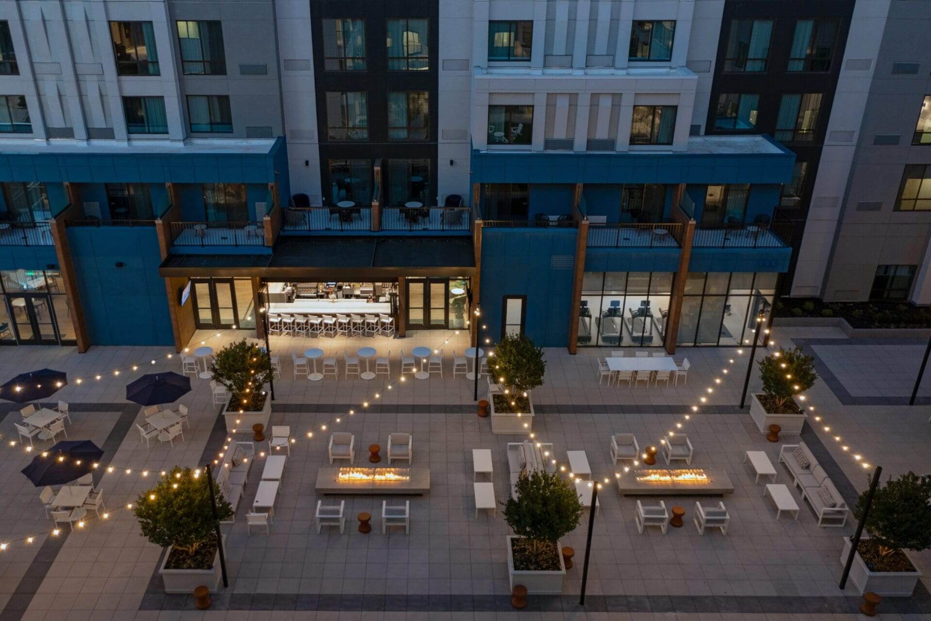 Outdoor patio with string lights at night.