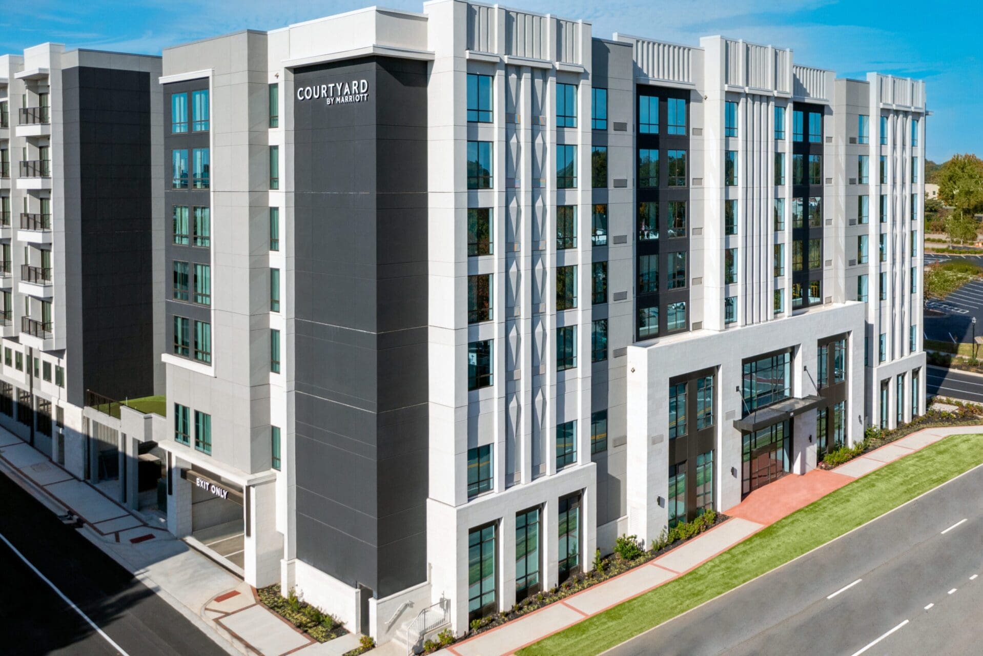 Modern hotel building with glass windows exterior.