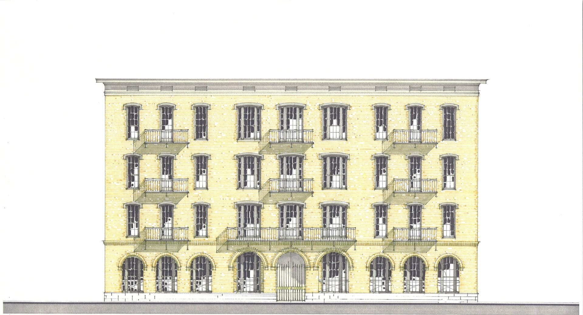 Historic four-story building with arched windows.