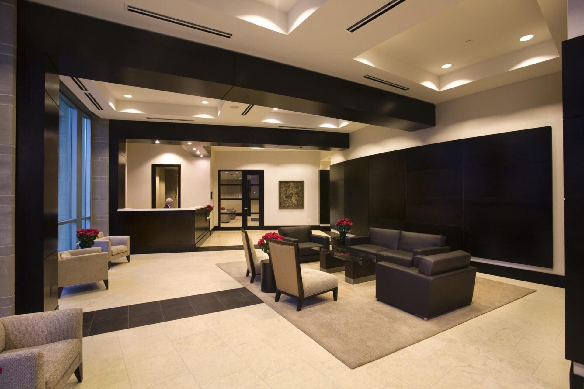 Modern office lobby with seating area.