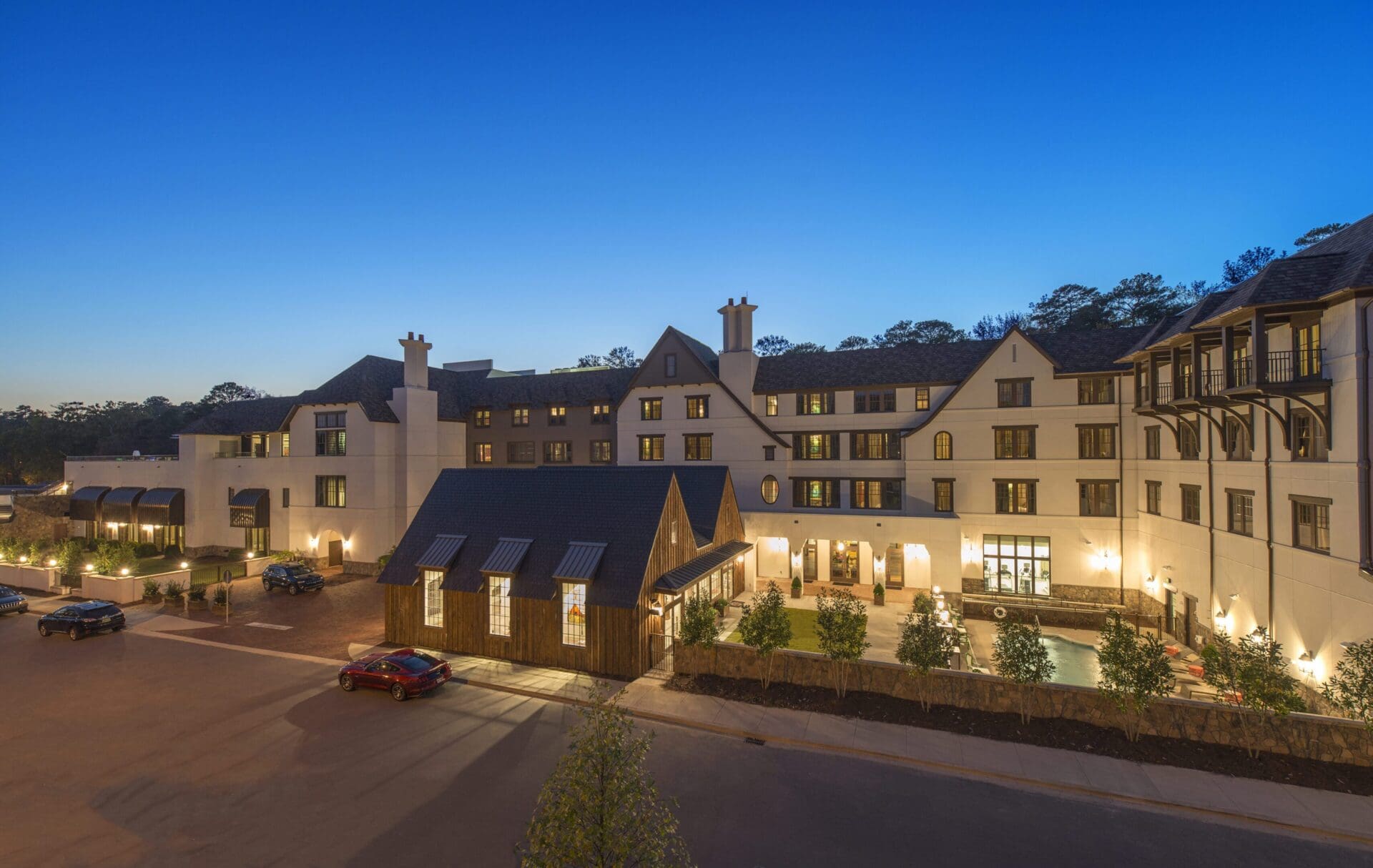 Luxury hotel complex lit at twilight