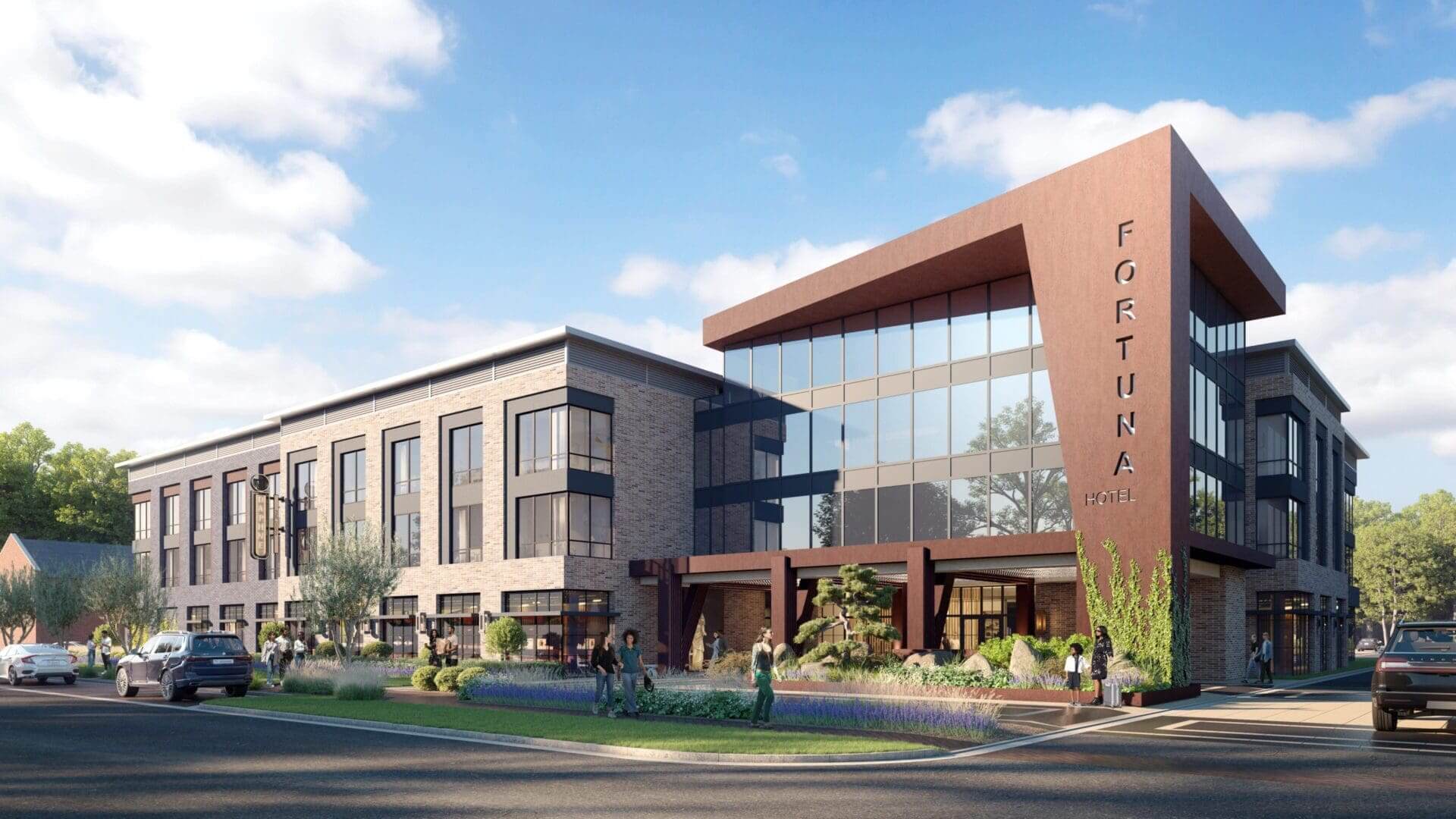 Modern building with glass and brick exterior.