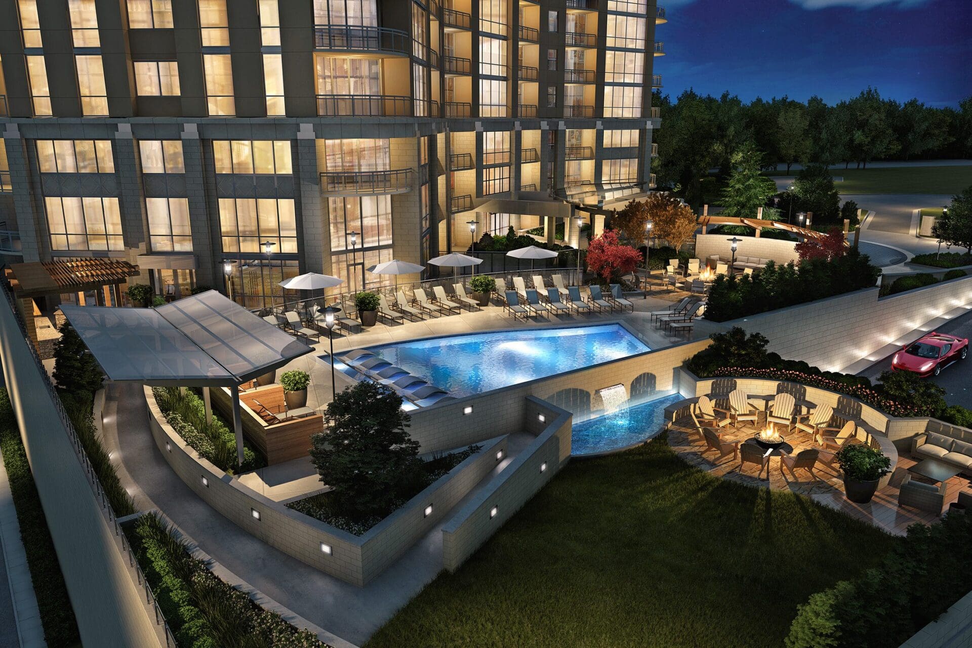 Luxurious hotel pool area at night.