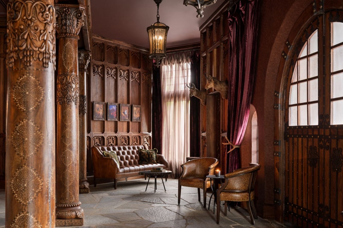 Luxurious vintage room with ornate wooden decor.