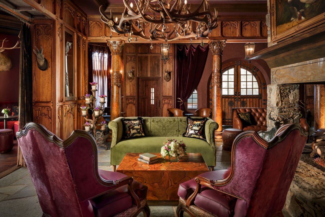 Luxurious rustic living room with ornate decor.
