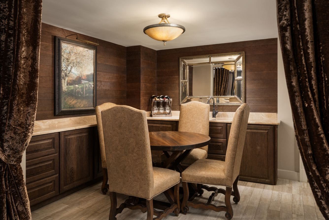 Cozy dining area with wooden furniture.