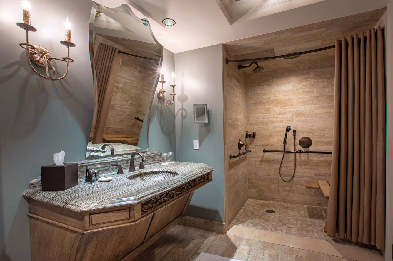 Elegant bathroom with shower and vanity area.