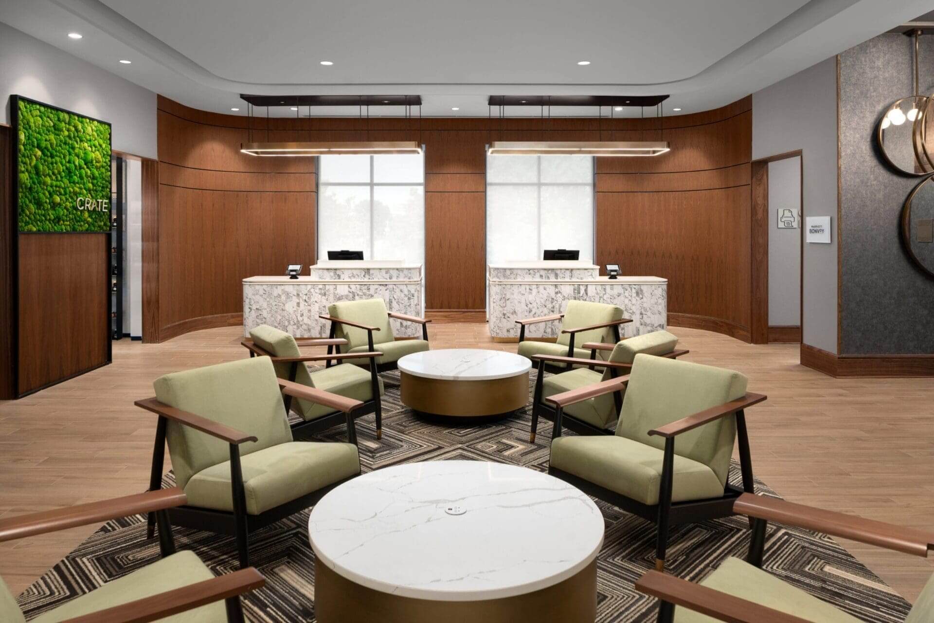 Modern reception area with seating and counters.