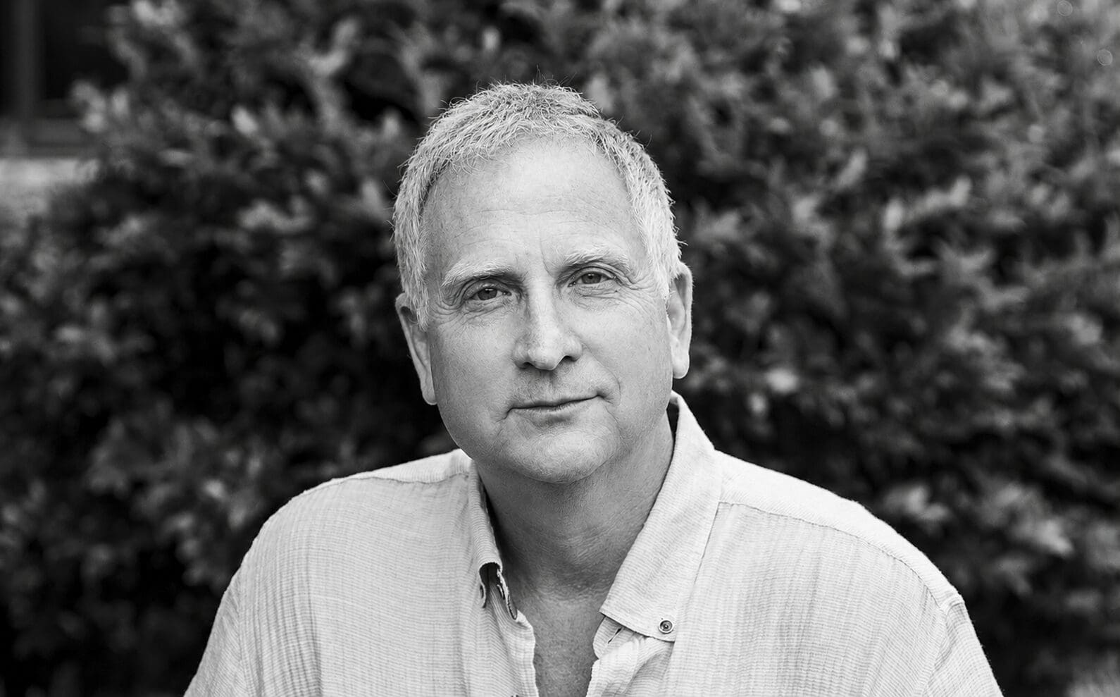 Black and white portrait of older man outdoors